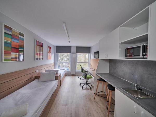 Apartamenty Collegia : photo 3 de la chambre chambre lits jumeaux standard