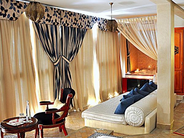 Palais Ommeyad Suites & Spa : photo 1 de la chambre suite avec jacuzzi