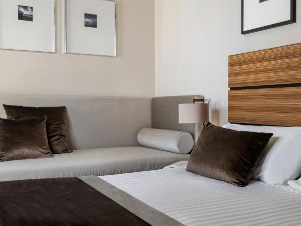 Hotel Ambasciatori : photo 3 de la chambre chambre quadruple deluxe