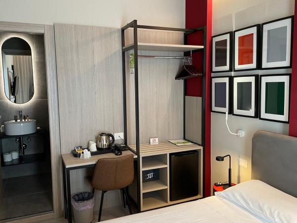 Hotel Iris ***S : photo 5 de la chambre chambre deluxe double ou lits jumeaux