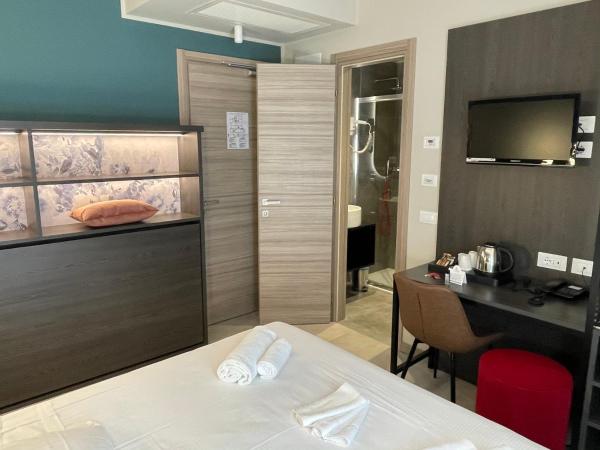 Hotel Iris ***S : photo 2 de la chambre chambre triple supérieure