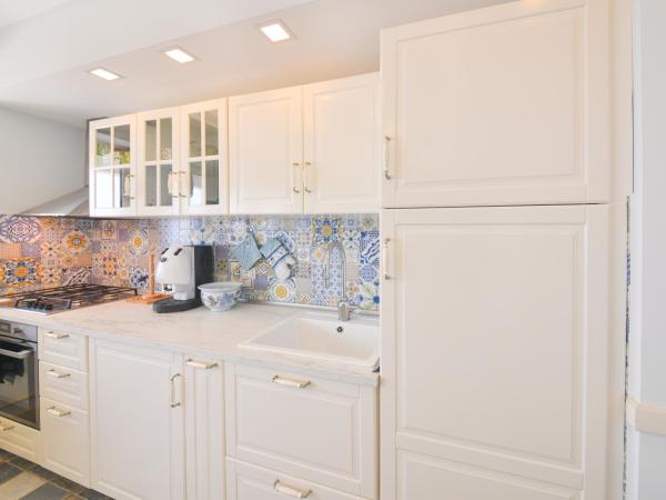 Belgodere di Mezzavia Apartments : photo 3 de la chambre appartement avec balcon