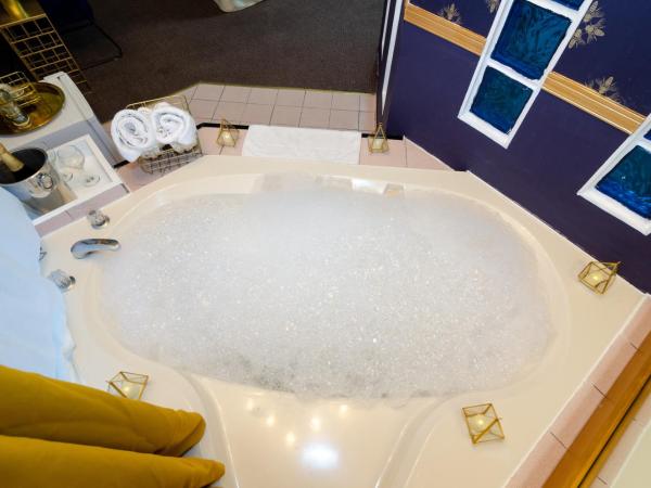 Hotel Dorion : photo 4 de la chambre suite avec baignoire spa