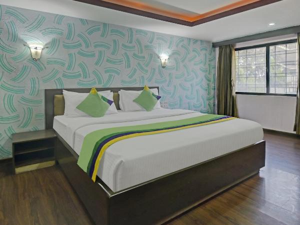 Treebo Savoury Sea Shell Residency : photo 1 de la chambre chambre double deluxe