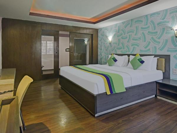 Treebo Savoury Sea Shell Residency : photo 6 de la chambre chambre double deluxe