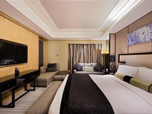 Mels Weldon Dongguan Humen : photo 2 de la chambre suite familiale