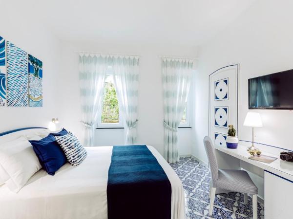 Villa Livia : photo 3 de la chambre chambre double - vue sur jardin