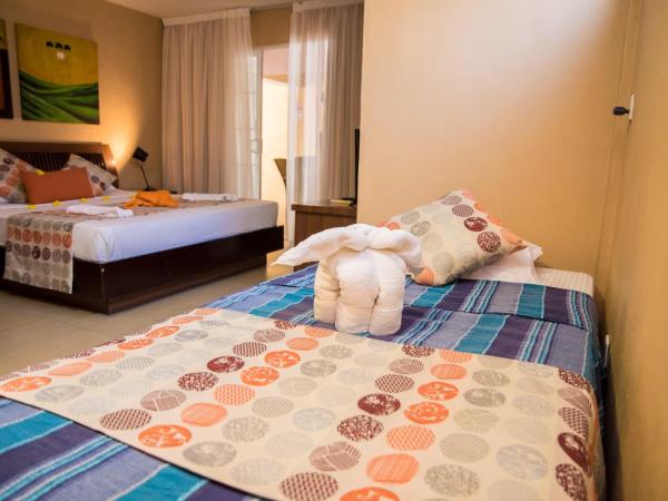 La Margarita : photo 1 de la chambre chambre triple - vue sur jardin