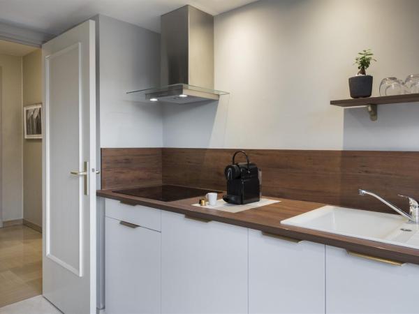 Warwick Reine Astrid - Lyon : photo 1 de la chambre suite premium