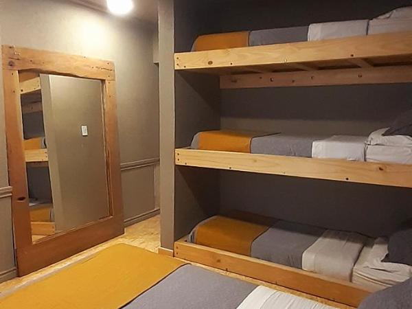 Bucanaan hostel boutique : photo 4 de la chambre chambre double ou lits jumeaux deluxe – vue sur jardin