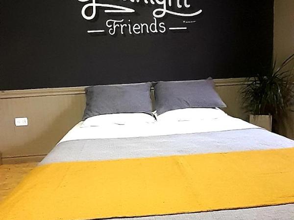 Bucanaan hostel boutique : photo 2 de la chambre chambre double ou lits jumeaux deluxe – vue sur jardin