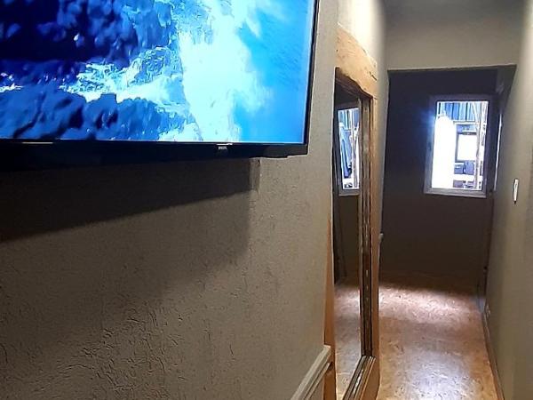 Bucanaan hostel boutique : photo 7 de la chambre chambre double ou lits jumeaux deluxe – vue sur jardin