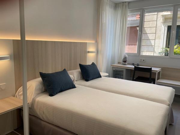 LC Hotel Urbano : photo 2 de la chambre chambre lits jumeaux deluxe