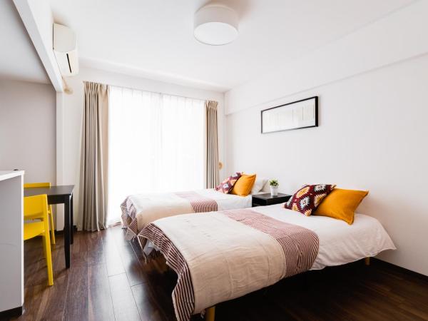 GuestHouse MIYABI : photo 1 de la chambre chambre lits jumeaux avec salle de bains privative