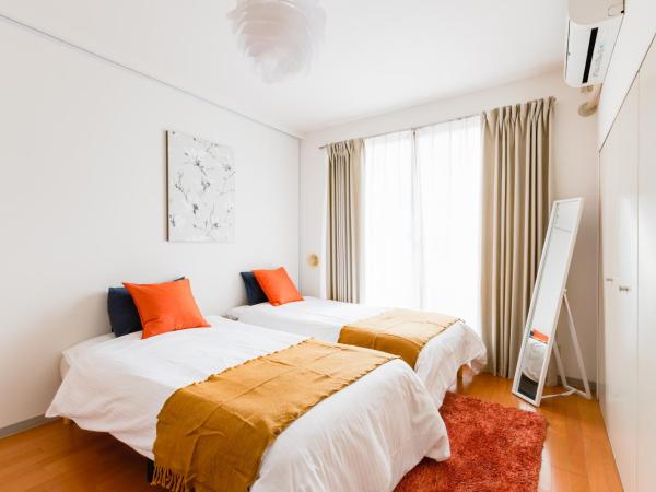 GuestHouse MIYABI : photo 1 de la chambre chambre lits jumeaux avec salle de bains privative