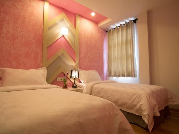 Sunshine Inn Plus : photo 4 de la chambre chambre lits jumeaux deluxe