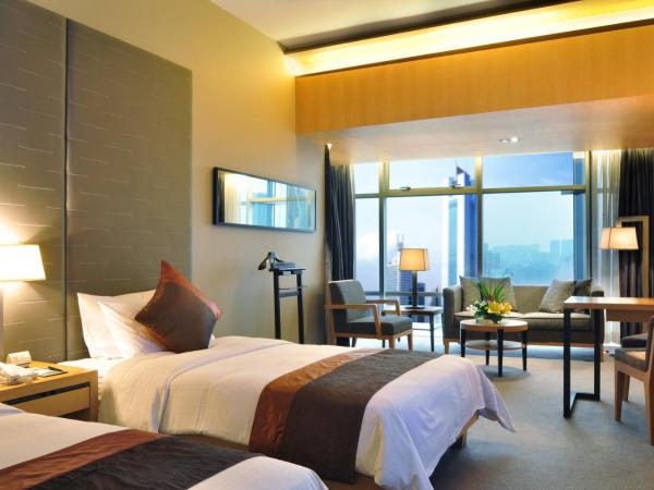 Jianguo Hotel Guangzhou : photo 3 de la chambre chambre lits jumeaux exécutive supérieure