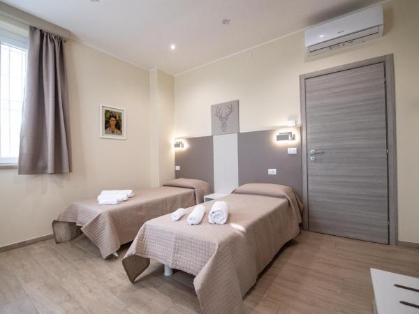 Le PALME : photo 2 de la chambre chambre lits jumeaux deluxe