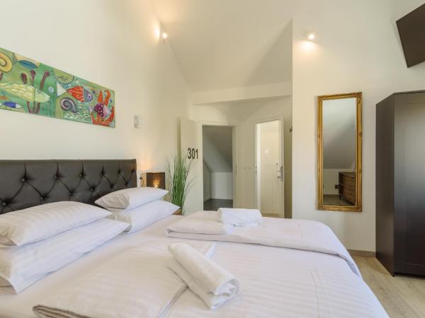 Hotel Vila White : photo 3 de la chambre chambre supérieure lit queen-size
