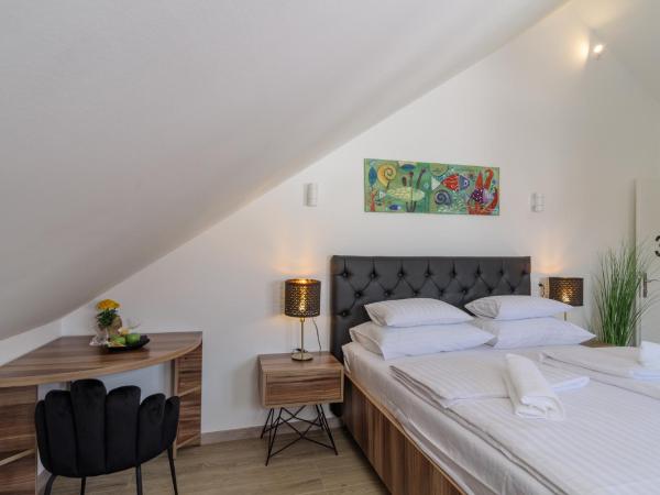 Hotel Vila White : photo 5 de la chambre chambre supérieure lit queen-size