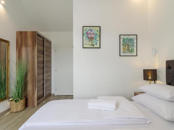 Hotel Vila White : photo 8 de la chambre chambre supérieure lit queen-size