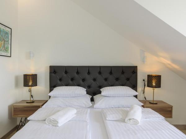 Hotel Vila White : photo 10 de la chambre chambre supérieure lit queen-size