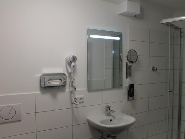 Apartment Hotel am Sand : photo 2 de la chambre chambre quadruple