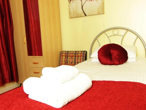 Rosemount Palace : photo 1 de la chambre chambre lits jumeaux