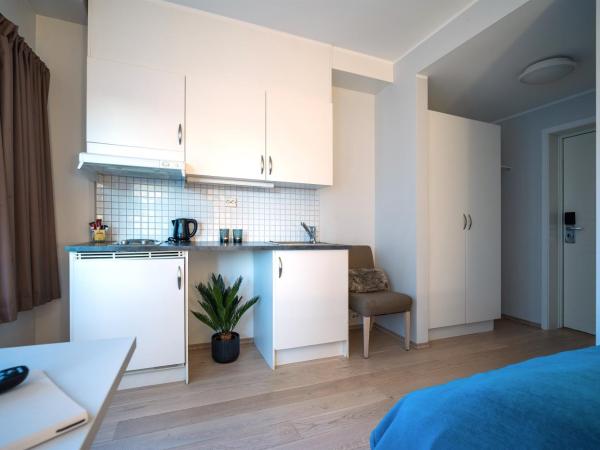 Enter City Apartment Hotel : photo 4 de la chambre chambre simple avec cuisine