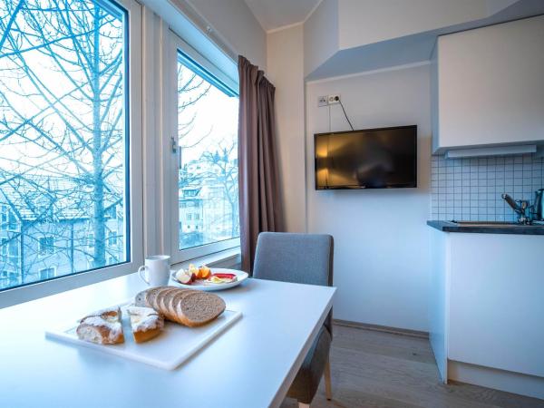 Enter City Apartment Hotel : photo 3 de la chambre chambre simple avec cuisine