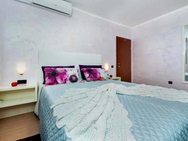 Apartments and Rooms Villa Dea ADULTS ONLY : photo 10 de la chambre appartement 1 chambre avec terrasse et vue sur le jardin