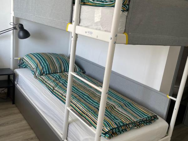 Panorama Hostel : photo 5 de la chambre chambre quadruple avec salle de bains commune