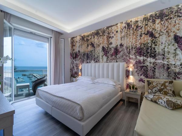 Hotel Stella D'Oro : photo 1 de la chambre chambre quadruple - vue sur mer