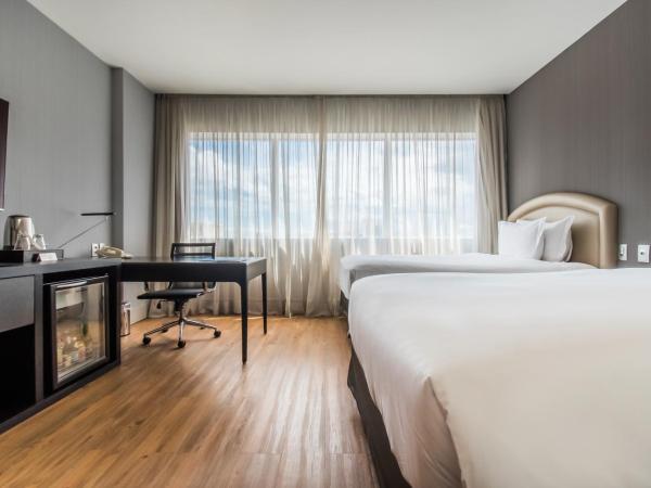 Pullman Sao Paulo Vila Olimpia : photo 1 de la chambre chambre lits jumeaux supérieure