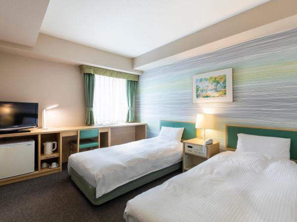 Business Inn Norte : photo 2 de la chambre chambre lits jumeaux - non-fumeurs