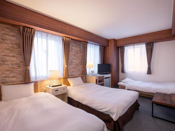 Business Inn Norte : photo 2 de la chambre chambre triple - non-fumeurs