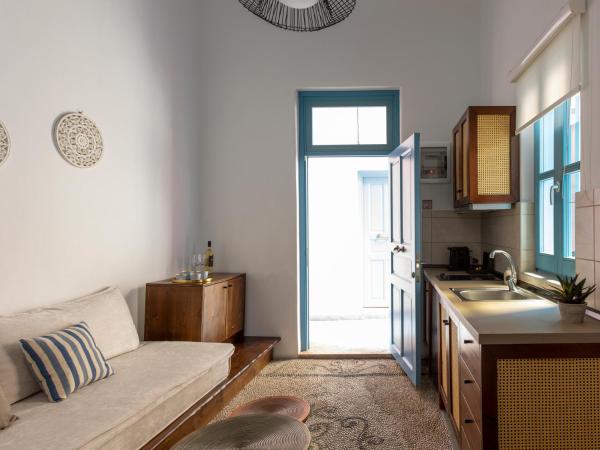 Blue Jasmine Suites : photo 9 de la chambre suiteΙama