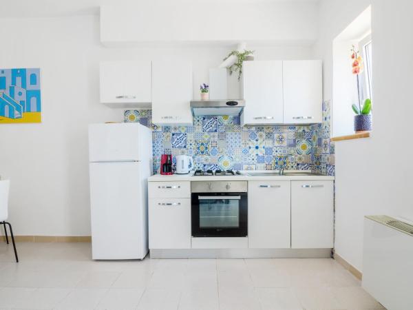 OraBlu Exclusive Villas : photo 5 de la chambre maison 2 chambres avec vue partielle sur la mer