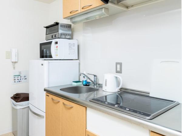 GuestHouse MIYABI : photo 7 de la chambre chambre lits jumeaux avec salle de bains privative