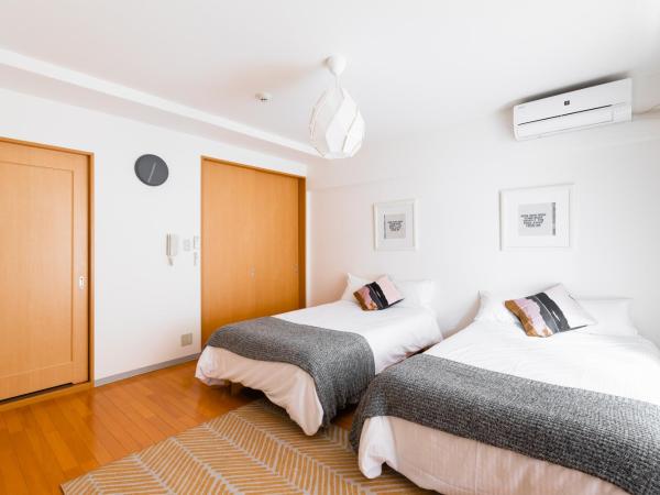 GuestHouse MIYABI : photo 3 de la chambre chambre lits jumeaux avec salle de bains privative