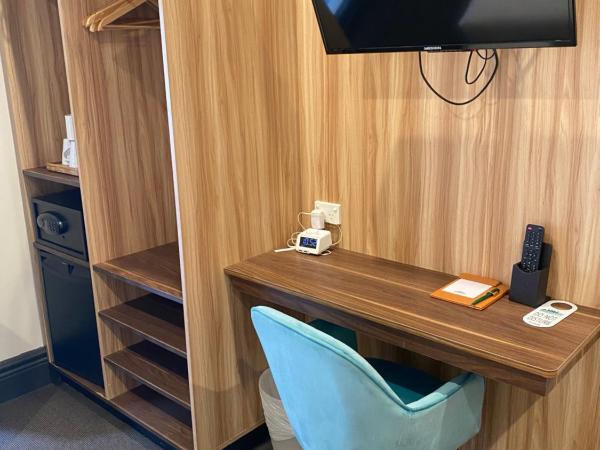 Glenferrie Lodge : photo 4 de la chambre suite familiale avec balcon et salle de bains commune