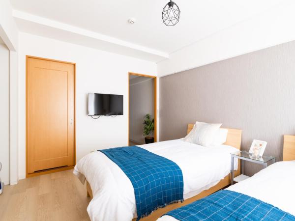 GuestHouse MIYABI : photo 1 de la chambre chambre lits jumeaux avec salle de bains privative