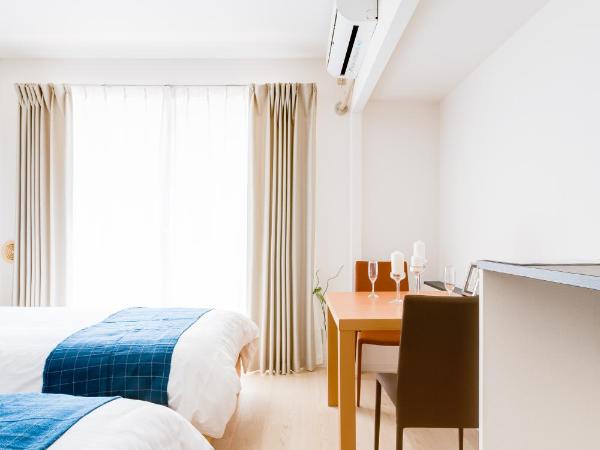 GuestHouse MIYABI : photo 4 de la chambre chambre lits jumeaux avec salle de bains privative