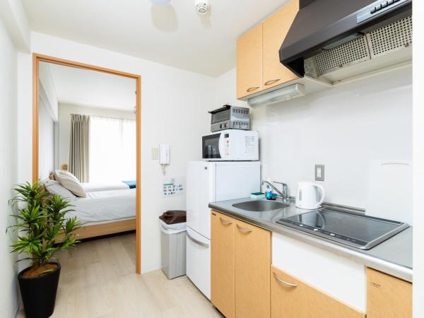 GuestHouse MIYABI : photo 5 de la chambre chambre lits jumeaux avec salle de bains privative