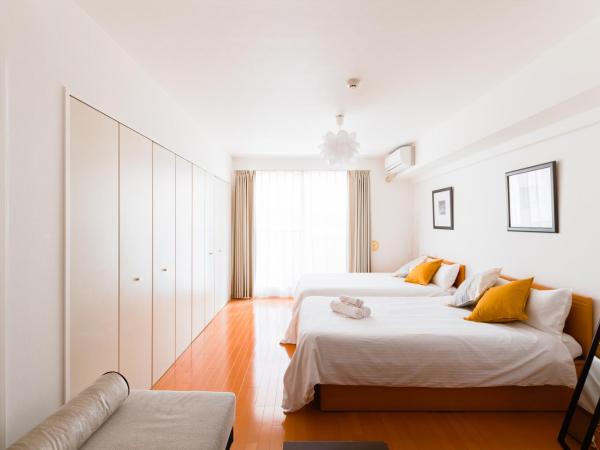 GuestHouse MIYABI : photo 2 de la chambre chambre lits jumeaux standard avec canapé