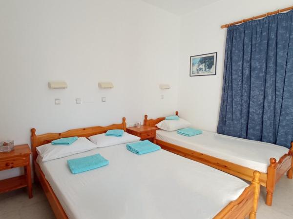 Ammosis Inn : photo 4 de la chambre chambre triple confort