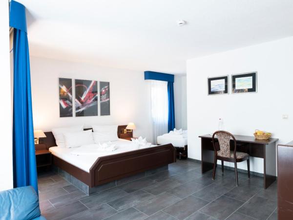 Hotel Astoria am Urachplatz : photo 9 de la chambre chambre double