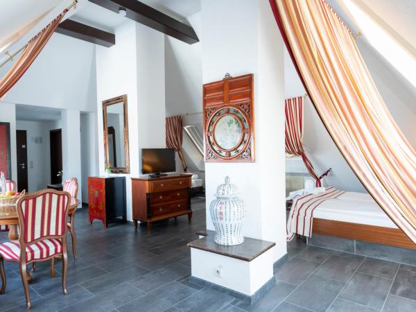 Hotel Astoria am Urachplatz : photo 2 de la chambre suite (6 adultes)