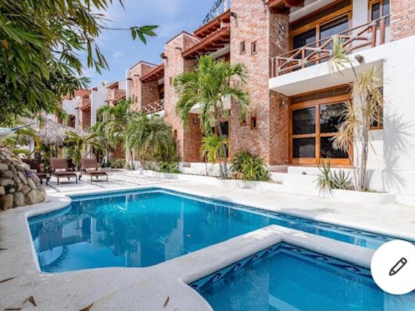 HOTEL VILLAS XAIBA : photo 1 de la chambre chambre lits jumeaux