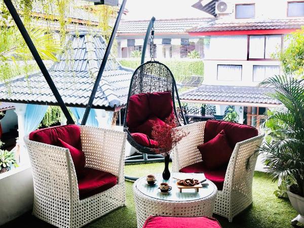 Raintree Boutique Villa & Gallery : photo 2 de la chambre suite junior - vue sur jardin